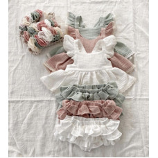 A set of shorts with ruffles and a dress