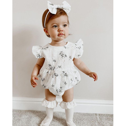 Summer romper with a bow on the head