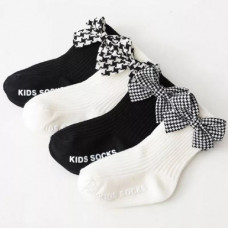 Knee socks with checkered bows